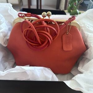 Vintage COACH Kisslock Frame Handbag in Coral Pink Leather